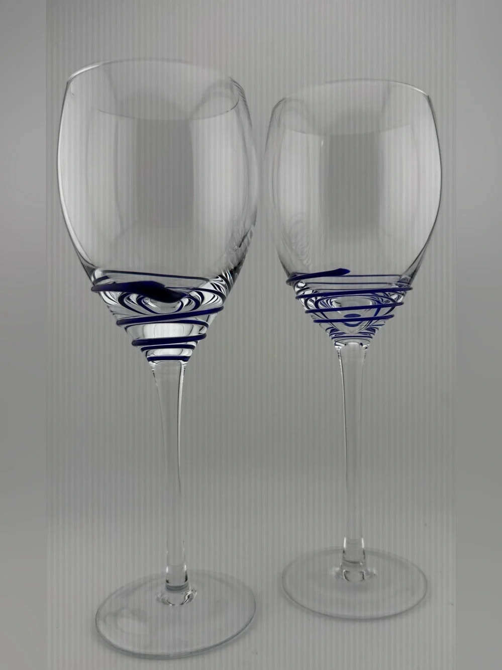 2 Pier 1 P1C44 blue swirl wine glasses. 10oz